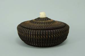 Image of baleen basket with seal head finial